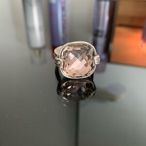 Silver Split-Band Ring with Textured Design. Light pink sparkly gem.